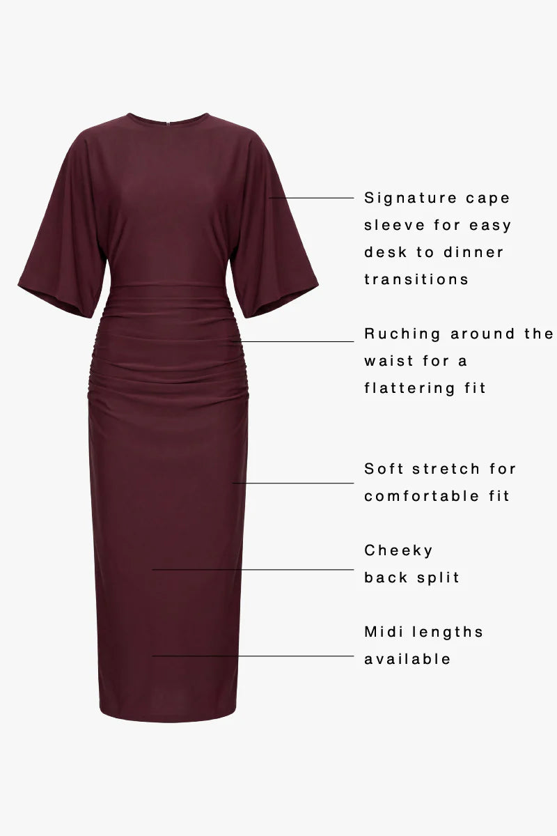 Maroon dress with features highlighted on a white background