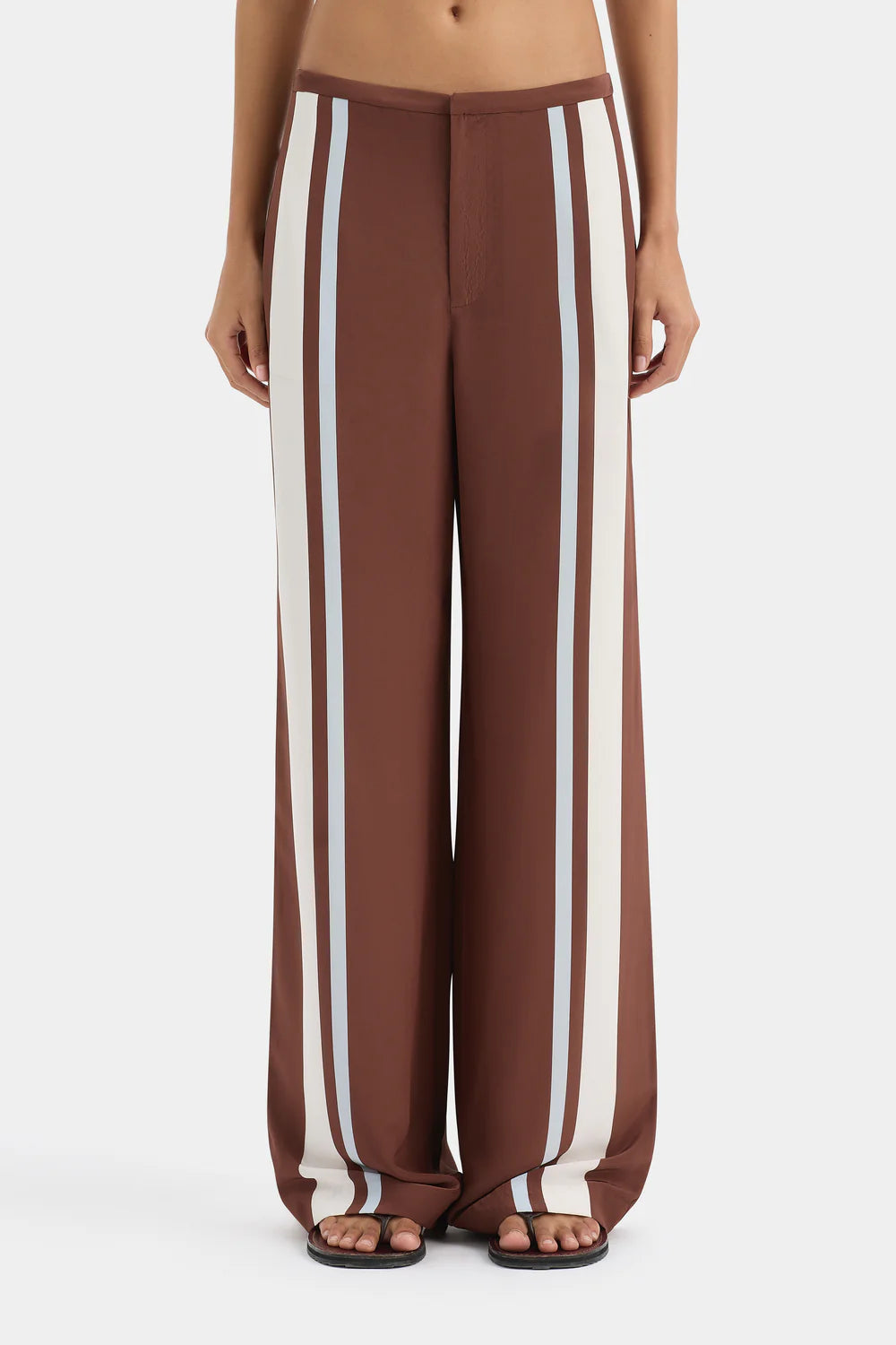 Brown wide-leg pants with white stripes on a white background