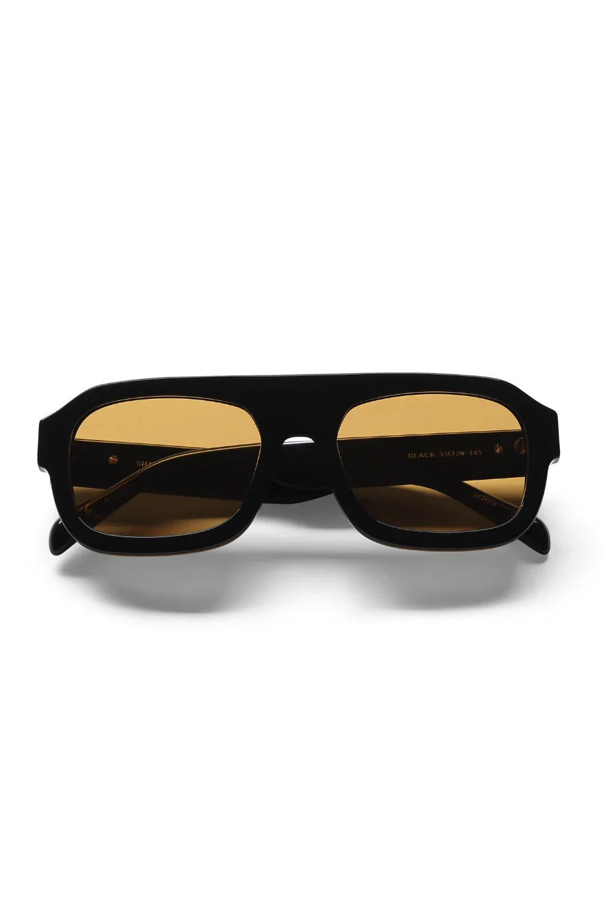 Black sunglasses with reflective lenses on a white background