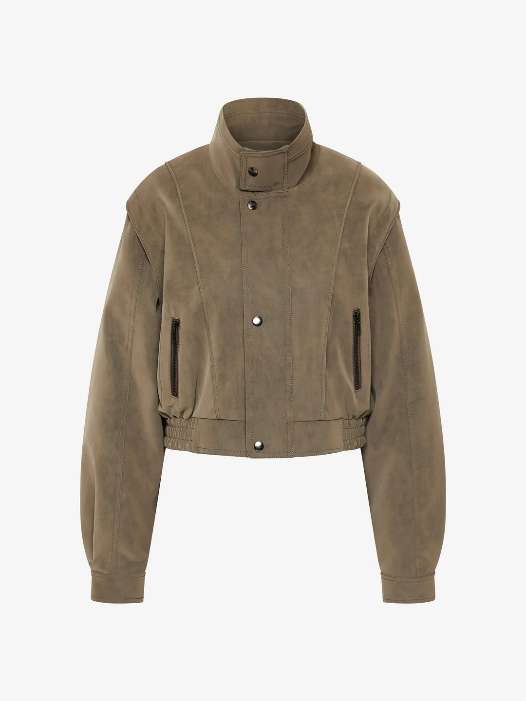 Zoli Bomber in Olive. A chic faux-suede bomber perfect for layering. Designed with panel detailing, internal wadding for warmth, elasticated waistband, and metal press-stud closures, combining structure with relaxed comfort.